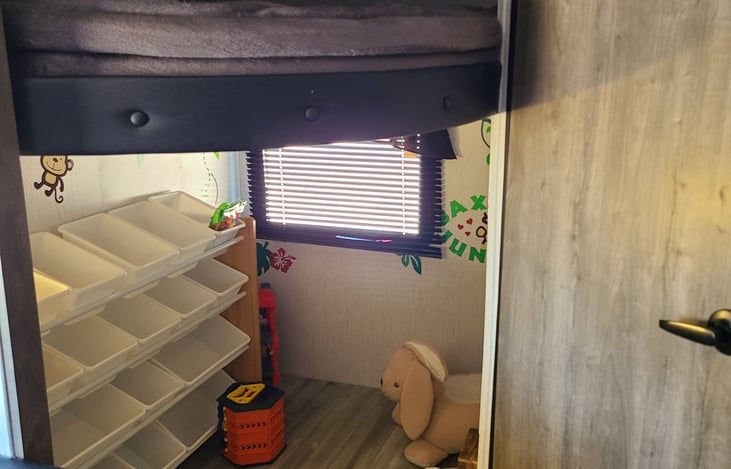 Kids play room complete with clean and sanitized toys like Legos, blocks, books etc