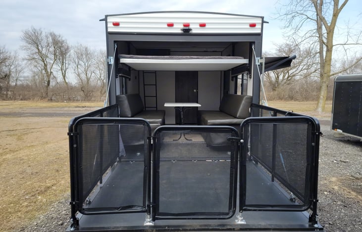 Garage ramp door converts into raised patio.  Perfect for camp chairs and enjoying the outdoors.