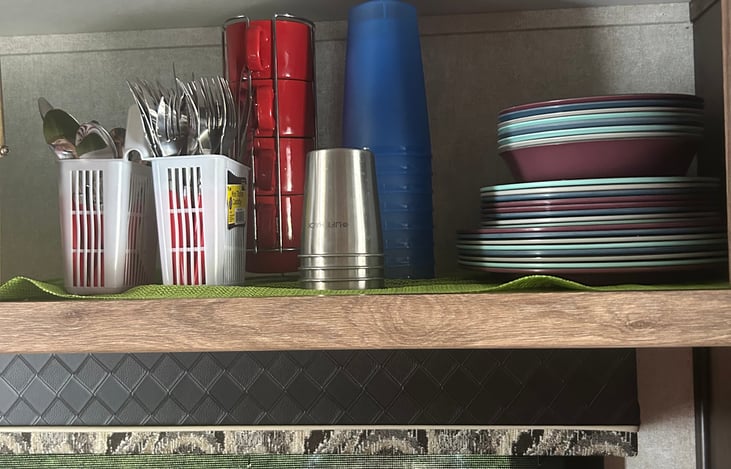 silverware, coffee cups, plastic cups, lg. plates, sm. plates, and bowls