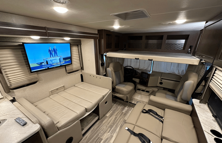 Electric drop down bunk over cab.