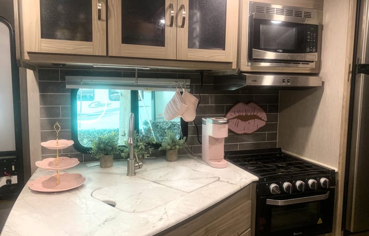 Kitchen area with two sink basins.  Keurig is included with rental.