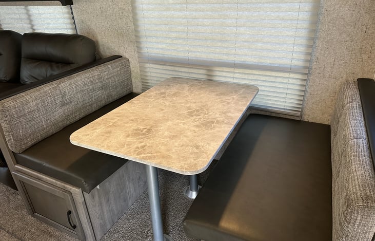 Roomy kitchenette with large window view.