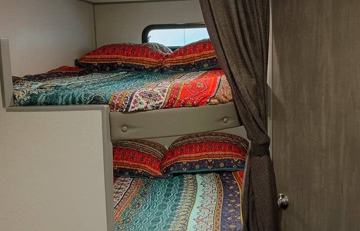 Full sized bunk beds can hold either two children each or one adult each comfortably (two small adults on bottom bunk)