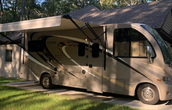 16 x 12 electric awning with LED lights and outside 32” smart TV.