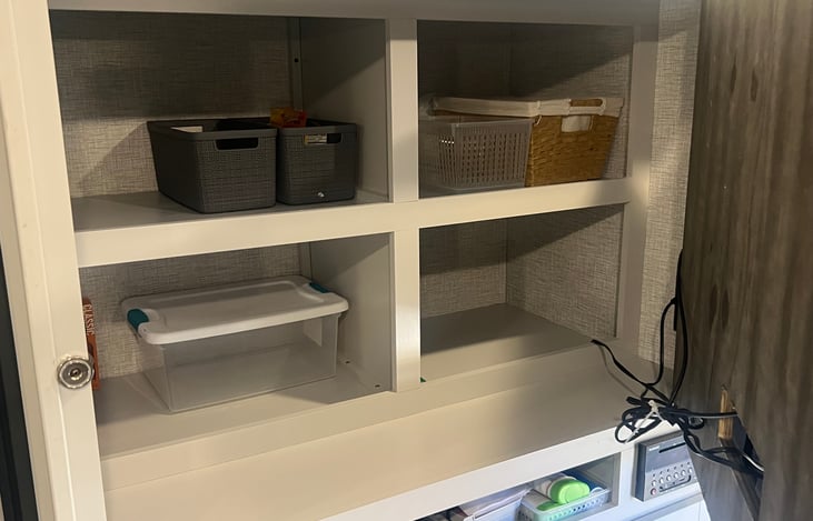 Inside- Pantry hidden behind TV