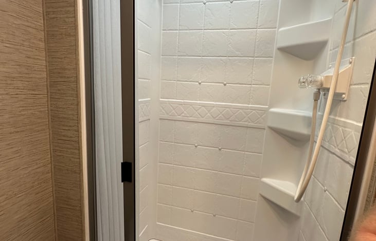 Shower with endless hot water! We upgraded to a tankless water heater so everyone can enjoy a warm shower.  The shower is good sized too. I’m over 6’ and I fit just fine.