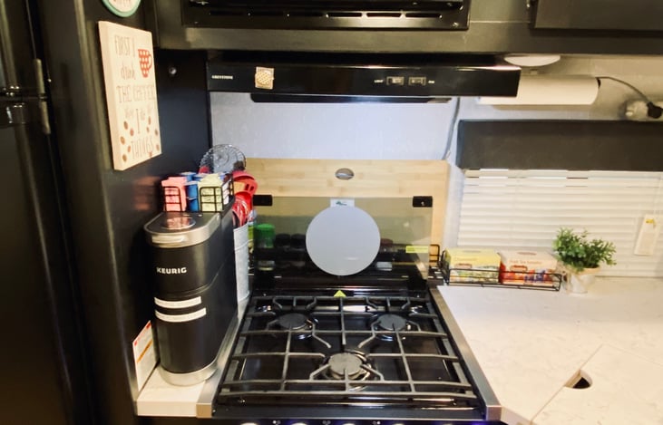 3-Burner gas stove with LED lights.