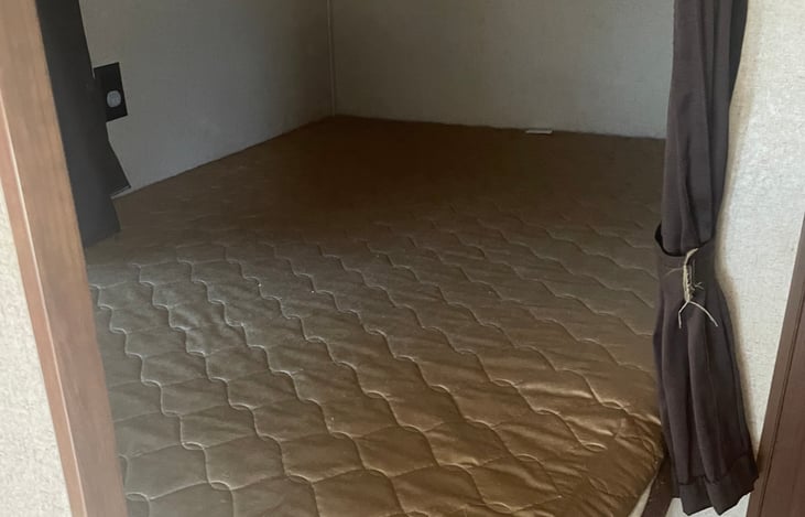 Large double bunks located at the back of the trailer.