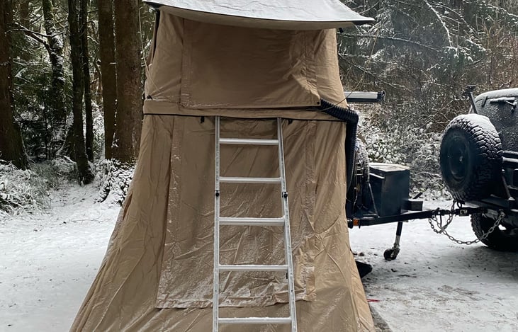 Pic of front of the additional tent.  Note that you cannot access lower tent from upper tent. You must climb out of the upper tent, go down the ladder, and go through the side door on the ground floor