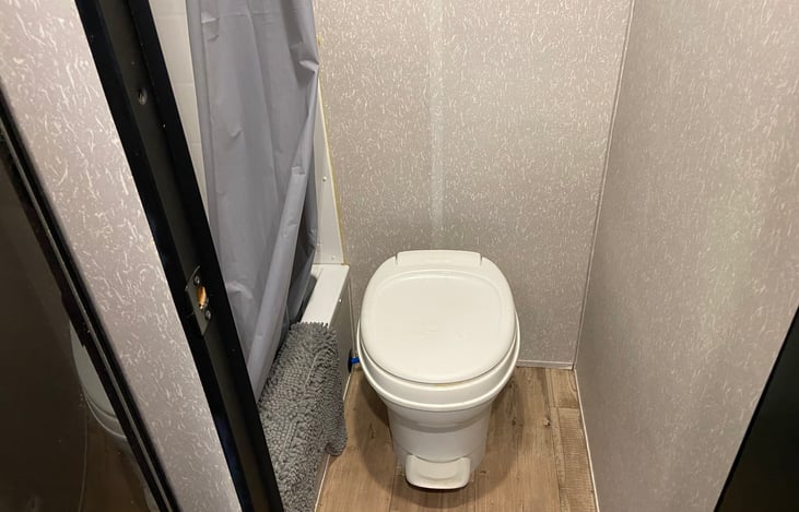 Dry bathroom with shower and toilet.