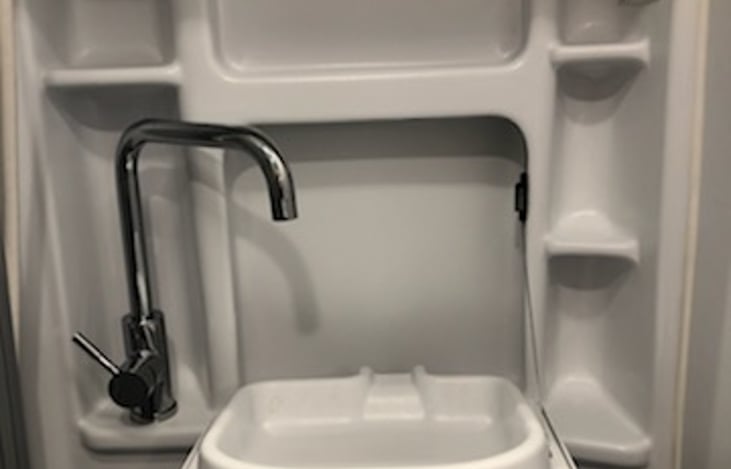 Tuck away bathroom sink.