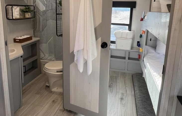 Full bathroom with shower and easy access from the main living area.