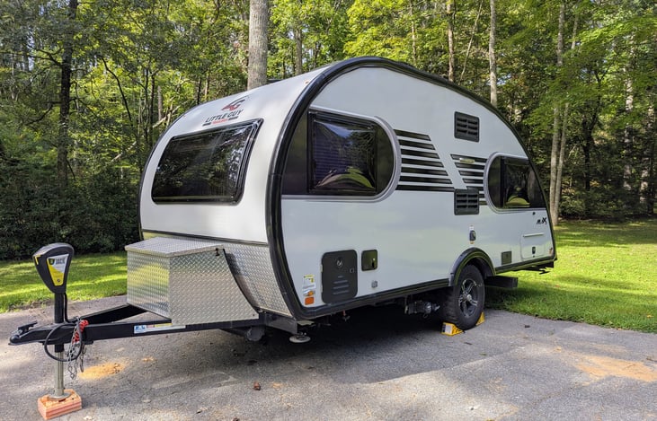 Rugged, cozy and classy, this easy-to-tow 2021 Little Guy Max is loaded with features and accommodations including Rough Rider package, solar, solid wood cabinetry, Queen bed, pop-out windows & more.