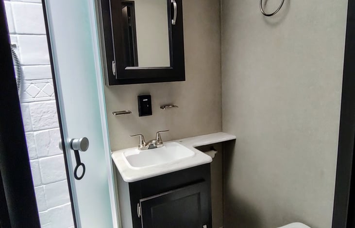 Indoor bathroom with stand up shower. You will need to bring your own towels and washcloths.