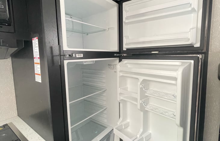 Inside fridge, runs on electricity
