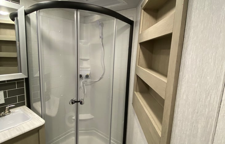 Storage shelves in bathroom