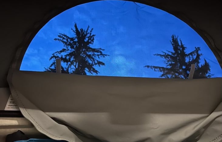 Open the upper “window” or screen for a great view of the sky from the pop top.