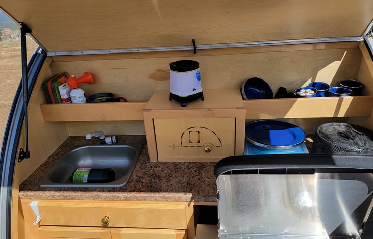 Rear.
This is where you find the sink, and cooking utensils, and where you prepare your drinks.