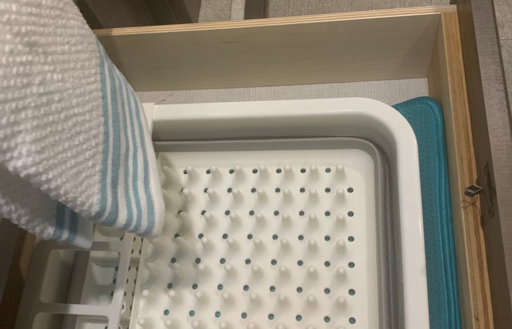 Under stove - drying rack and mat