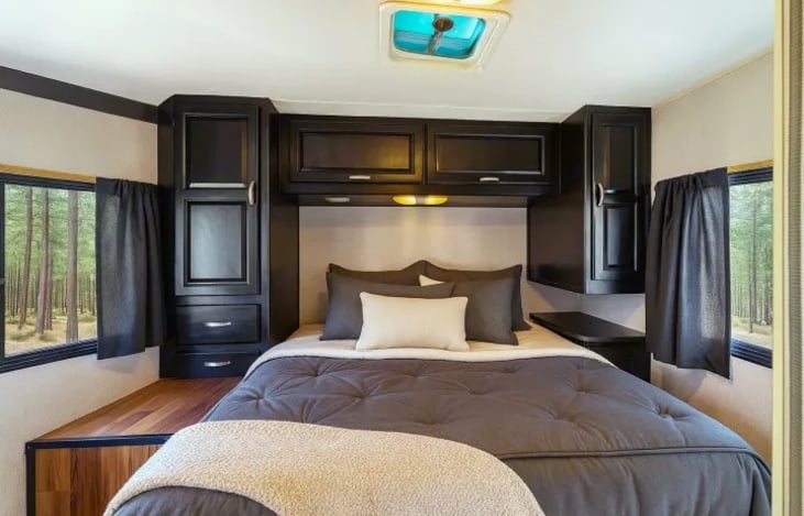 Perfect for glamping or family road trips — the Thor Majestic 28A bedroom offers peace, comfort, and space for 6