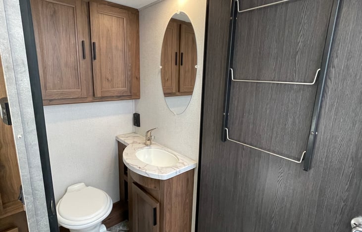 Private bathroom and sink. Keep the wife happy with no walks to the campground toilet