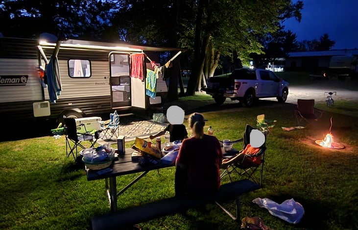 LED Light Bar under awning can change to favorite color and/or blink to different colors and patterns with remote control.