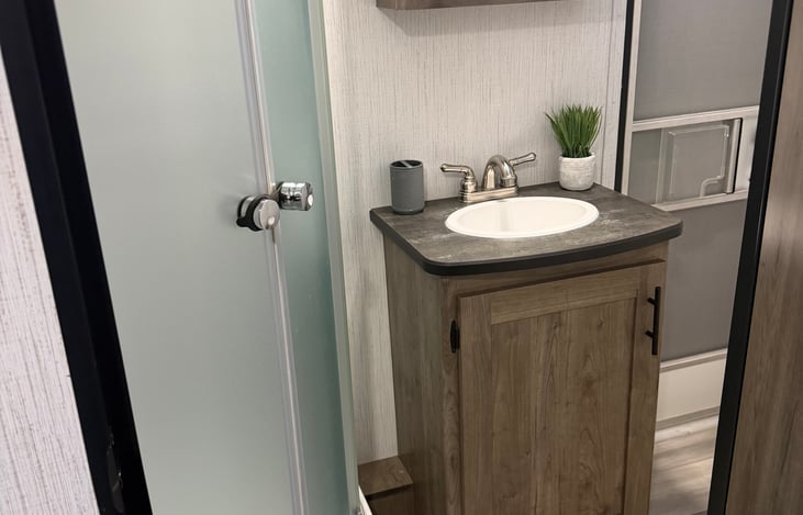 Full bath with upgraded toilet for better water flow.
