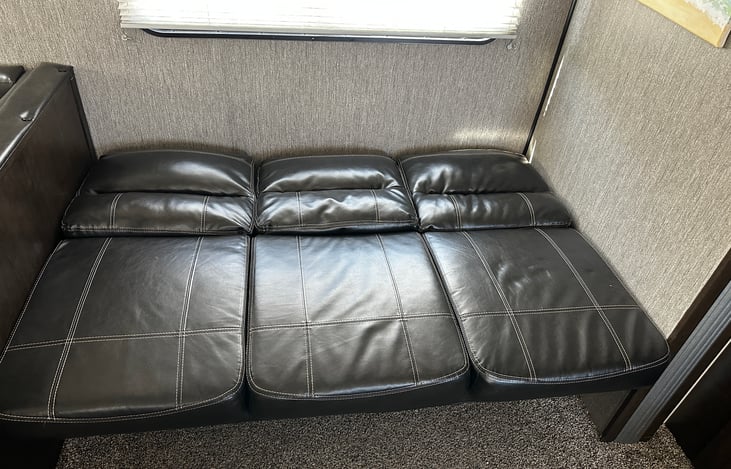Couch folds into a bed.
