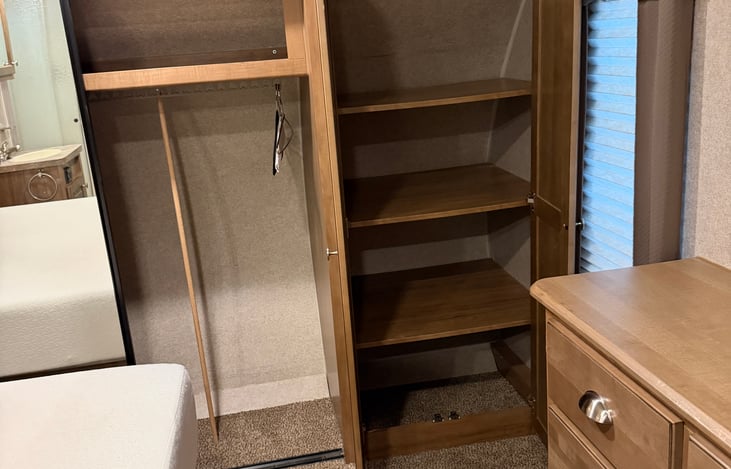 Master Closet with shelf storage area