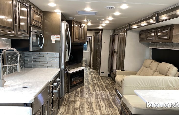 View with fireplace on.