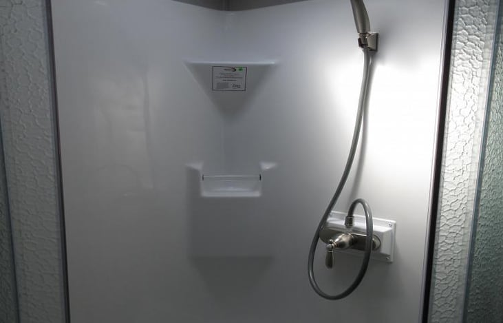 Tall shower with sky light!