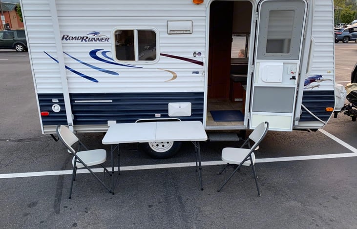 Picnic foldable table and chairs are included!