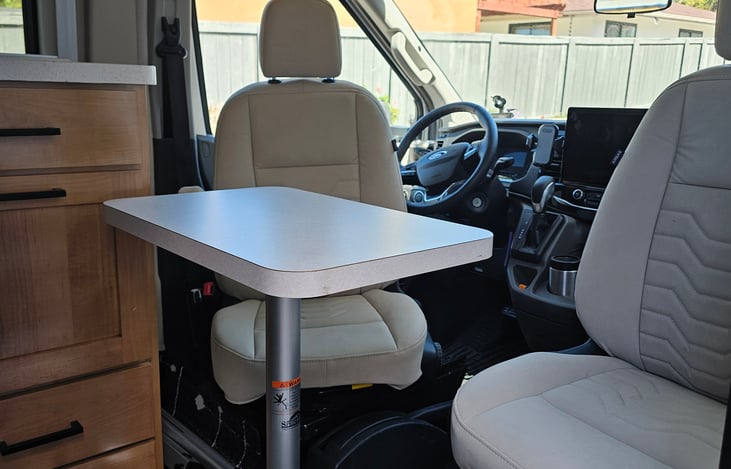 Front seats with table for eating or games!