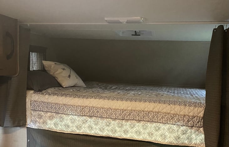 Queen size bed over cab