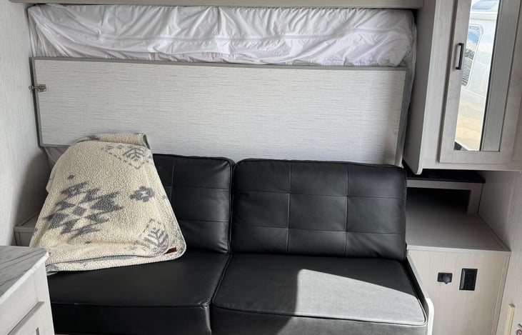 Sofa that folds down into a queen bed.