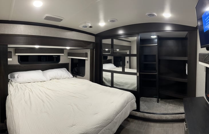 Master bedroom with king size mattress