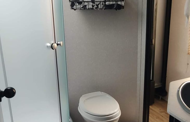 Large shower/bathroom can accessed from master suite, hallway as well as exterior for easy access to restroom while little ones are resting in the their rooms. I love this feature!!