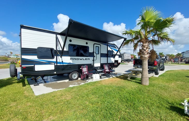 Power Retractable awning for needed shade as well, all windows have been tinted to help beat the heat