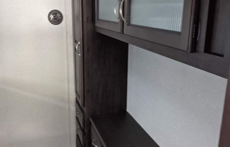 Bunk room storage cabinets and a place for tv