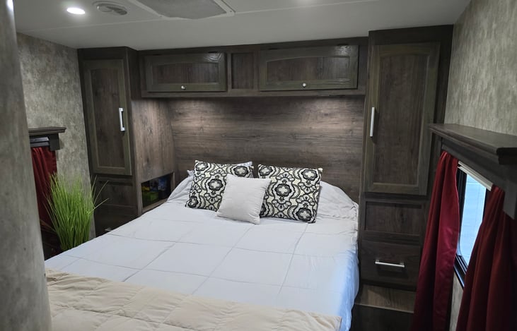 Walk around bedroom with queen bed.