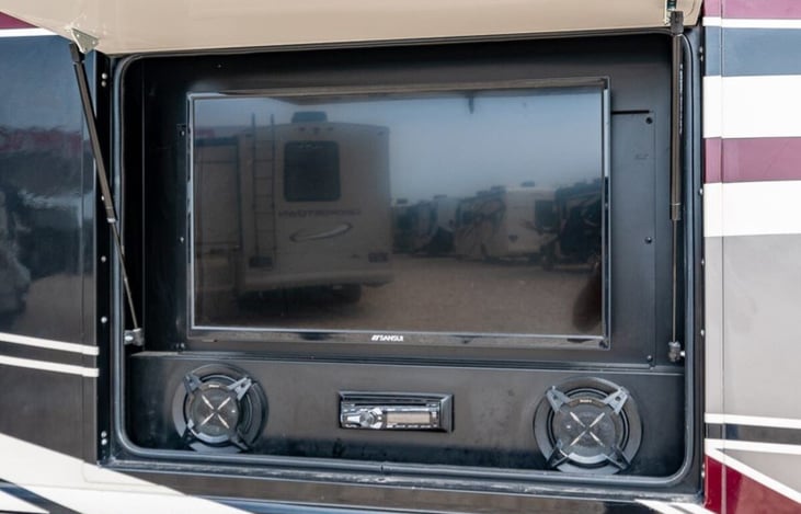 Outdoor entertainment system with Bluetooth and DVD.