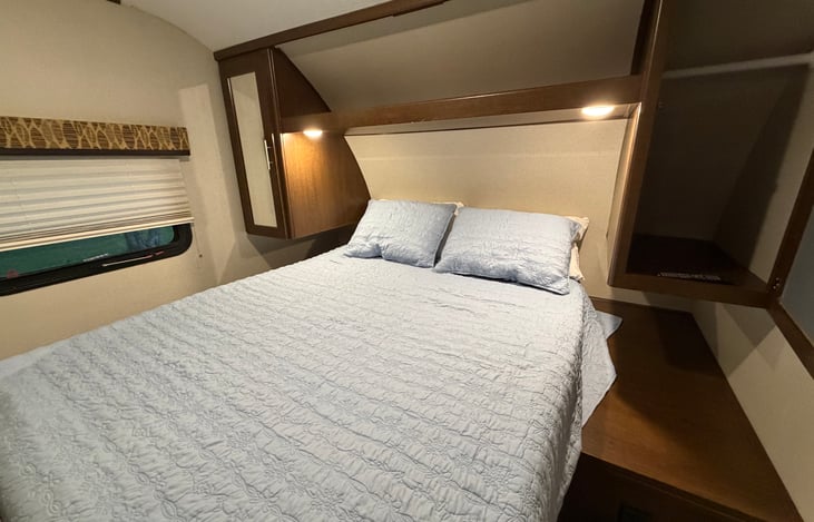 Queen mattress with 3 inch top, storage above and beside bed