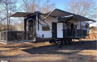 42’ Luxury Toyhauler with rare Side Patio