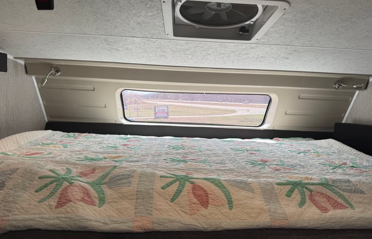 Large overhead bunkbed with extra padded mattress!