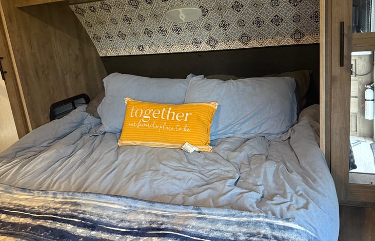 Private queen master bedroom with dual closets. Extra storage under bed.