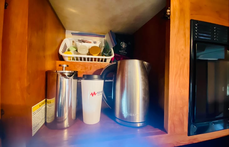 Morning coffee and teas, french press coffee maker and hot water pot, tea pot