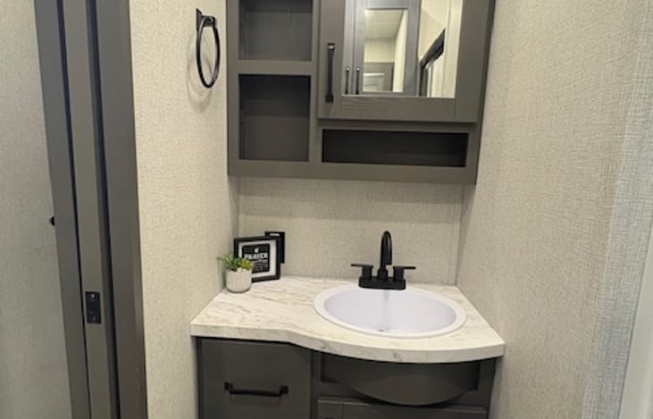 Stylish finishes, smart storage and modern design make even the small spaces feel elegant.