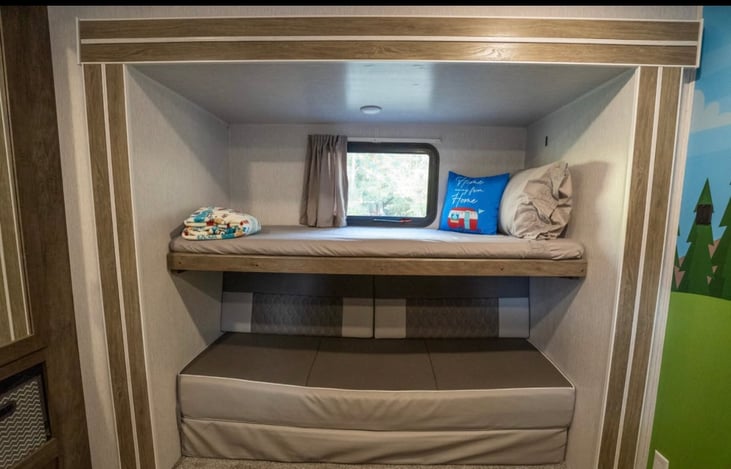 Back bunkroom- queen and 3 twins beds, TV, bean bag chair, own AC unit