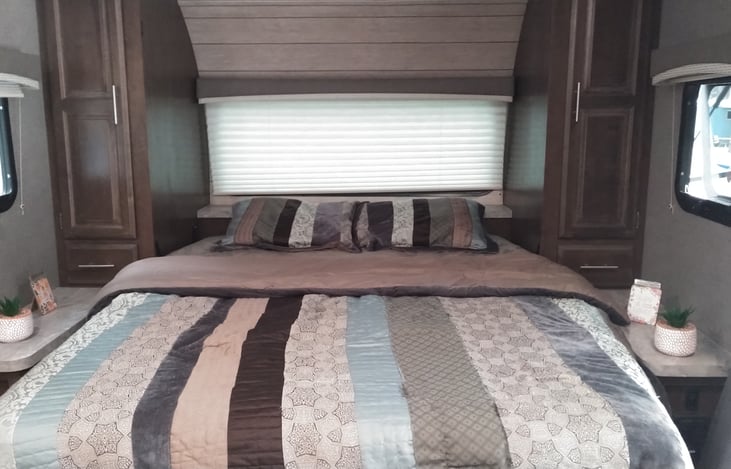 Queen size pull down bed.
