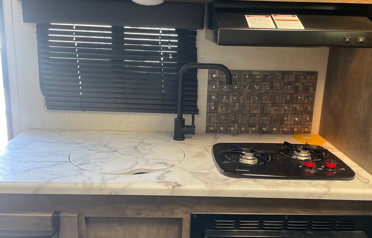 Sink, gas stove top, microwave unit